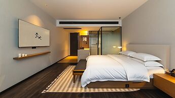 Wuye WOO YEAH Tangchi Hotel