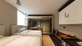 Wuye WOO YEAH Tangchi Hotel