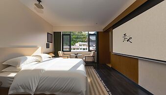 Wuye WOO YEAH Tangchi Hotel