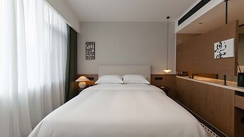 Wuye WOO YEAH Tangchi Hotel