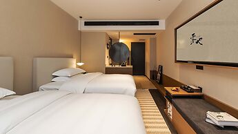 Wuye WOO YEAH Tangchi Hotel