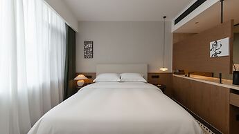 Wuye WOO YEAH Tangchi Hotel