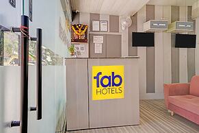 Fabhotel Golden Galaxy