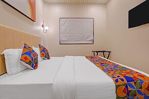 Fabhotel Golden Galaxy