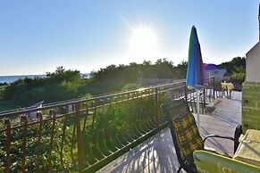 Shared Gardened Accommodation With bbq and sea View