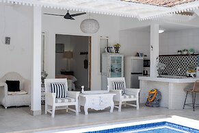 Peacock Bungalow by Pertama Stay