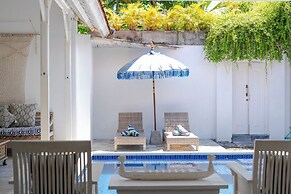 Peacock Bungalow by Pertama Stay