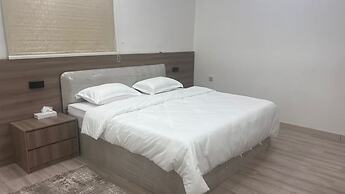 Al Salam Two Bedrooms Hall Kitchen a5