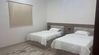 Al Salam Two Bedrooms Hall Kitchen a5