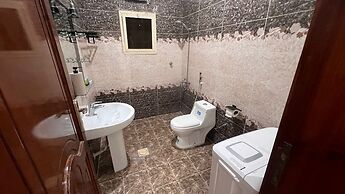 Al Salam Two Bedrooms Hall Kitchen a5