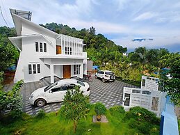 Cool Nest Pool Villa Munnar by VOYEHOMES