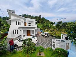 Cool Nest Pool Villa Munnar by VOYEHOMES