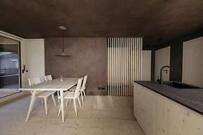 Atto Apartments & Suites