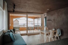 Atto Apartments & Suites