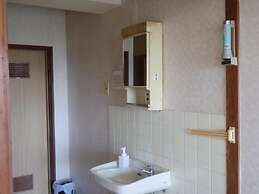 Kobe Guesthouse - Hostel