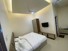 R J Residency