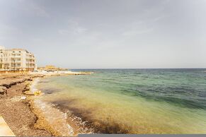 Seafront Gozo Escape BBQ Backyard by Qbajjar Bay