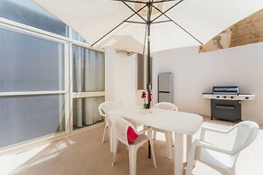 Seafront Gozo Escape BBQ Backyard by Qbajjar Bay