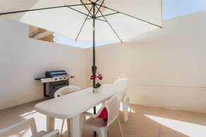 Seafront Gozo Escape BBQ Backyard by Qbajjar Bay
