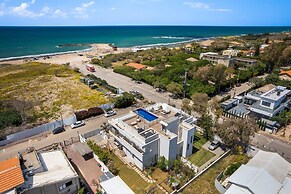 Garden& Rooftop Beachfront Apartment