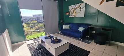 Luxurious Green Riverside Loft Apartment