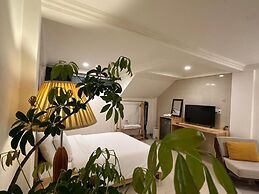 CozyNook Boutique Apartments