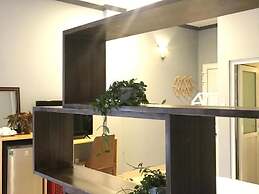 CozyNook Boutique Apartments