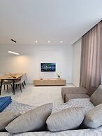 Joel Family Apartment's Golem Center