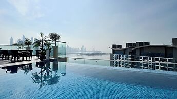 Elegant Palm Studio with Sea View & Pool