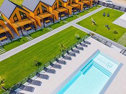 Holiday Homes With Access to a Pool, Sauna and Jacuzzi