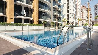 Azizi Riviera Studio with Pool & Parking