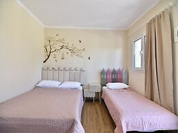 Spacious Beachfront Retreat With Large Garden in Ormos Panagias
