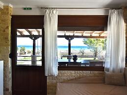 Spacious Beachfront Retreat With Large Garden in Ormos Panagias