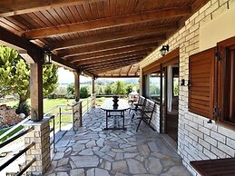 Spacious Beachfront Retreat With Large Garden in Ormos Panagias