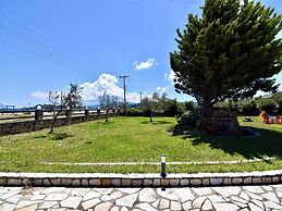 Spacious Beachfront Retreat With Large Garden in Ormos Panagias