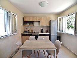 Spacious Beachfront Retreat With Large Garden in Ormos Panagias