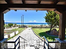 Spacious Beachfront Retreat With Large Garden in Ormos Panagias