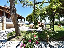 Spacious Beachfront Retreat With Large Garden in Ormos Panagias