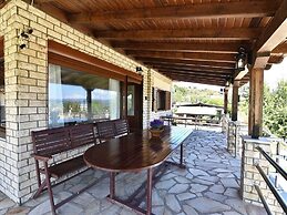 Spacious Beachfront Retreat With Large Garden in Ormos Panagias