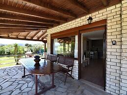 Spacious Beachfront Retreat With Large Garden in Ormos Panagias