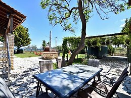 Spacious Beachfront Retreat With Large Garden in Ormos Panagias