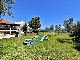 Spacious Beachfront Retreat With Large Garden in Ormos Panagias
