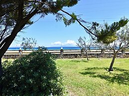 Spacious Beachfront Retreat With Large Garden in Ormos Panagias