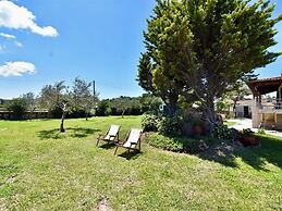 Spacious Beachfront Retreat With Large Garden in Ormos Panagias