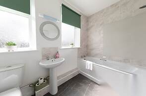 Spacious 4BR Newcastle Home Sleeps 7