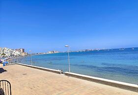 Beachfront 3BR Condo w Pool Views Sleeps 10