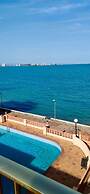 Beachfront 3BR Condo w Pool Views Sleeps 10