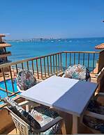 Beachfront 3BR Condo w Pool Views Sleeps 10