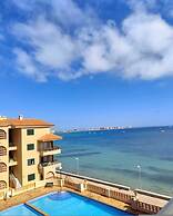 Beachfront 3BR Condo w Pool Views Sleeps 10