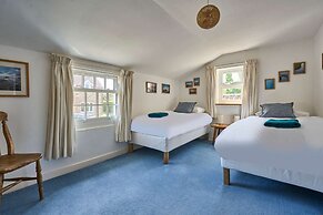 Host Stay Teal Cottage